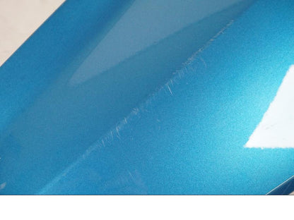 Baksidan på Sidkåpa från en BMW C400X -2018 motorcykel.