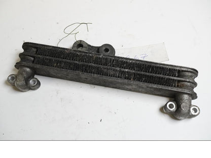 Vänster sida på Oljekyl från en Honda VTR 1000 F -1997 motorcykel.