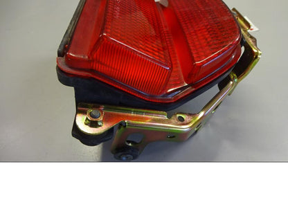 Vänster sida på Baklampa från en Honda CBR 900 RR -1996 motorcykel.