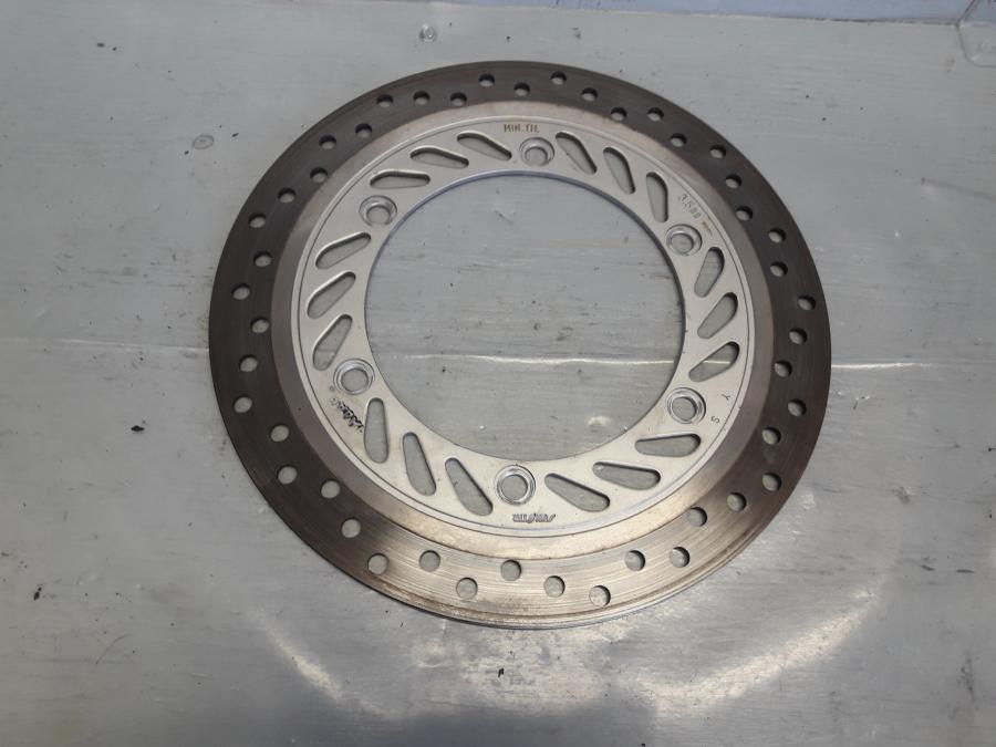 Framsidan på Bromsskiva från en Honda CBR 125 R -2008 motorcykel.