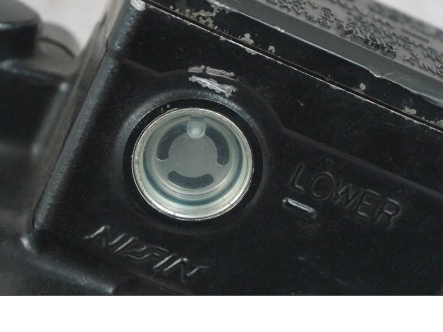 Baksidan på Bromshuvudcylinder från en Buell 1125 R -2008 motorcykel.