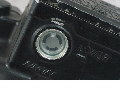 Baksidan på Bromshuvudcylinder från en Buell 1125 R -2008 motorcykel.