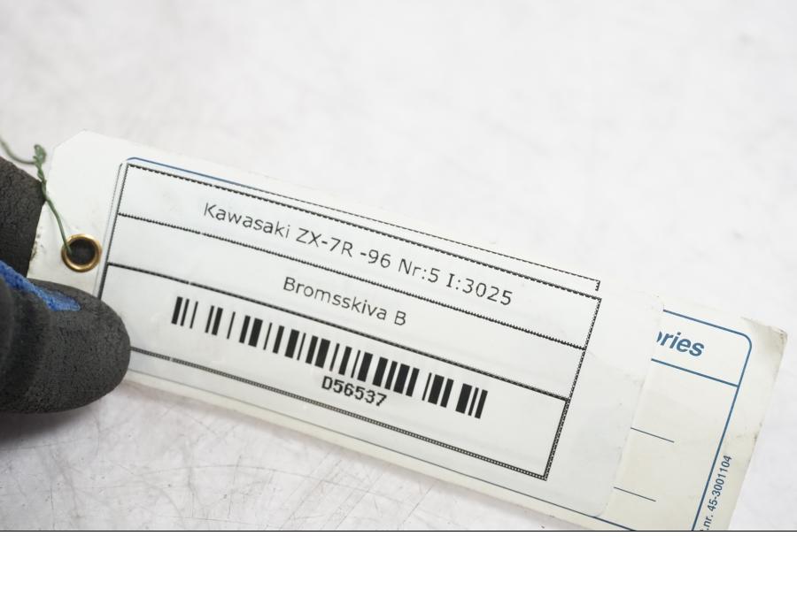 Baksidan på Bromsskiva från en Kawasaki Ninja 300 -2013 motorcykel.