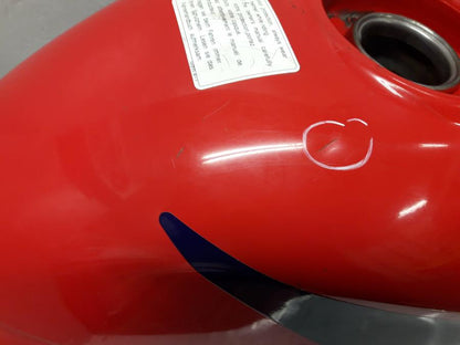 Vänster sida på Bensintank från en Honda CBR 125 R -2005 motorcykel.