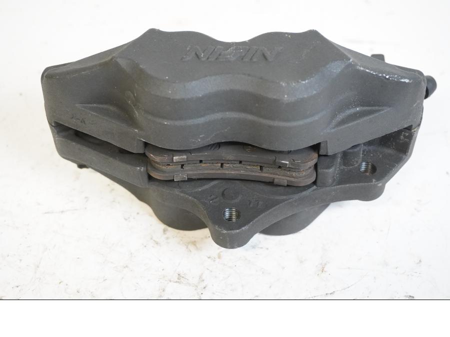 Höger sida på Bromsok från en Honda VTR 1000 F -2003 motorcykel.