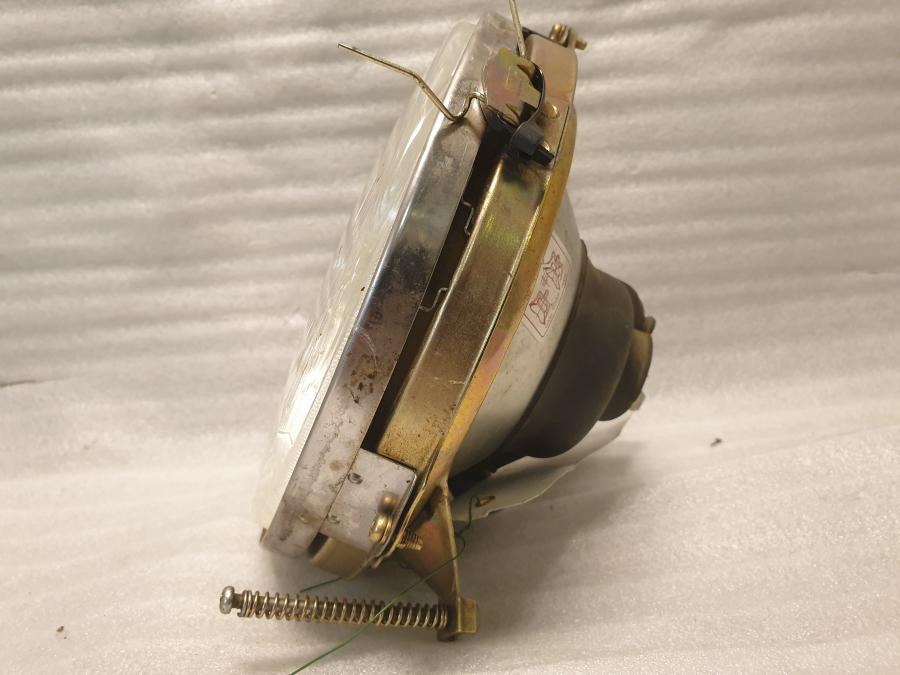 Baksidan på Strålkastarinsats från en Yamaha XV 1600 -2002 motorcykel.