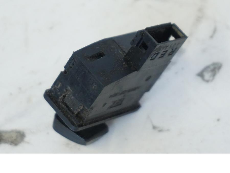 Snett nerifrån på Tryckknappsreglage från en Honda SH 300 A -2011 scooter.