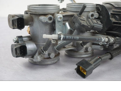 Baksidan på Spjällhus från en Kawasaki Z 900 -2019 motorcykel.