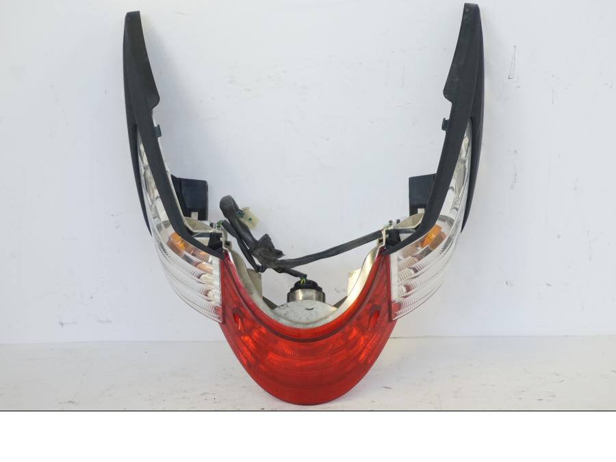 Snett uppifrån på Baklampa från en Honda SH 300 A -2011 scooter.