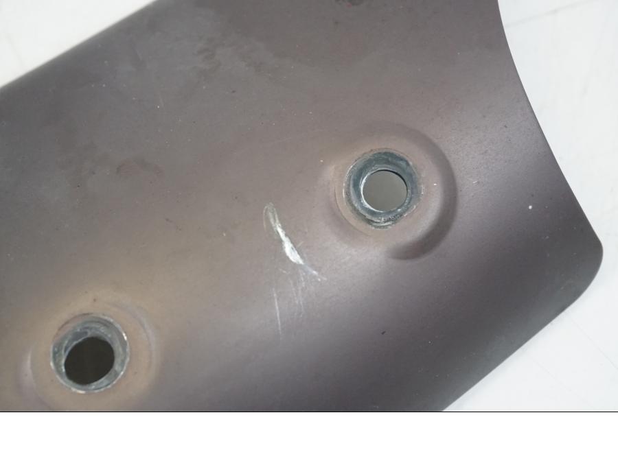 Baksidan på Värmeskydd från en Ducati Streetfighter S -2011 motorcykel.