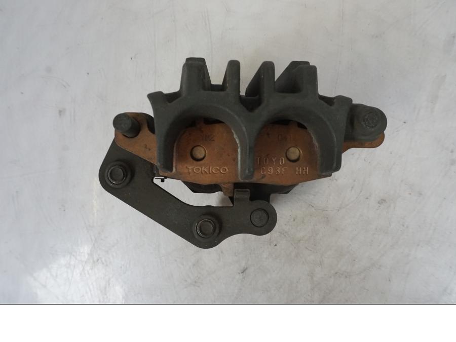 Vänster sida på Bromsok från en Kawasaki ER-6F -2010 motorcykel.