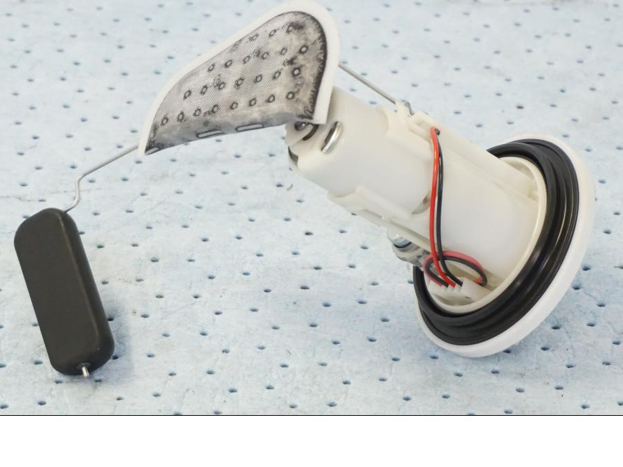 Höger sida på Bensinpump insprut från en Honda SH 300 A -2011 scooter.