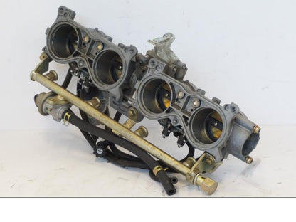 Baksidan på Spjällhus från en Honda CBR 900 RR -2001 motorcykel.