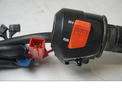 Vänster sida på Styrelreglage från en Honda CBR 600 -1995 motorcykel.