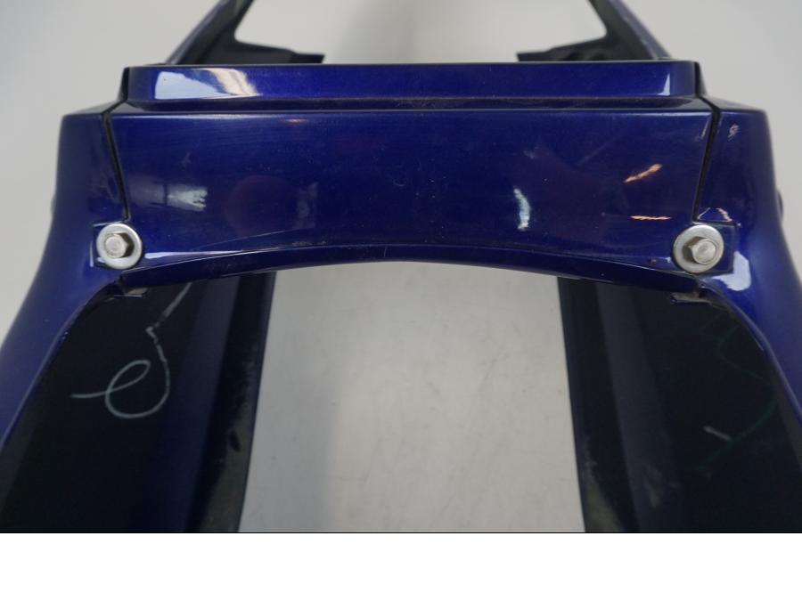 Vänster sida på Bakvinge från en Honda CBR 125 R -2006 motorcykel.