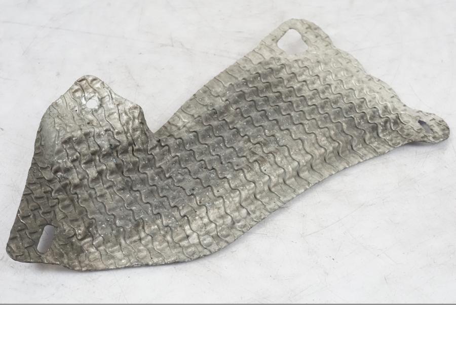 Framsidan på Värmeskydd från en Suzuki GSX-R 750 -2007 motorcykel.