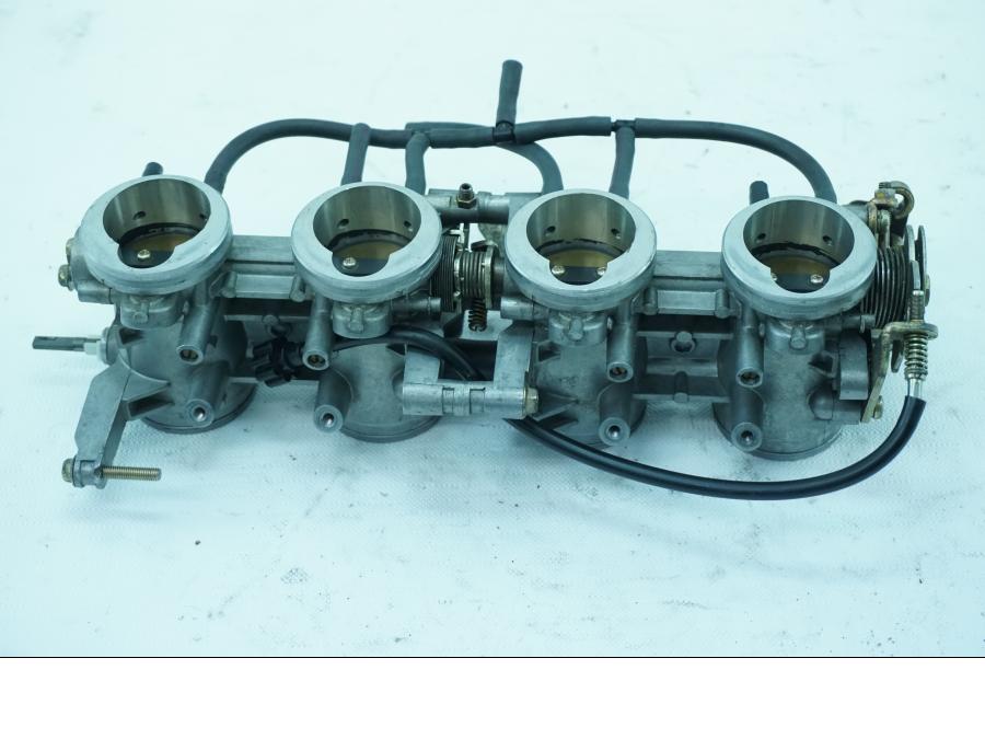 Vänster sida på Spjällhus från en Kawasaki ZX-6R -2004 motorcykel.