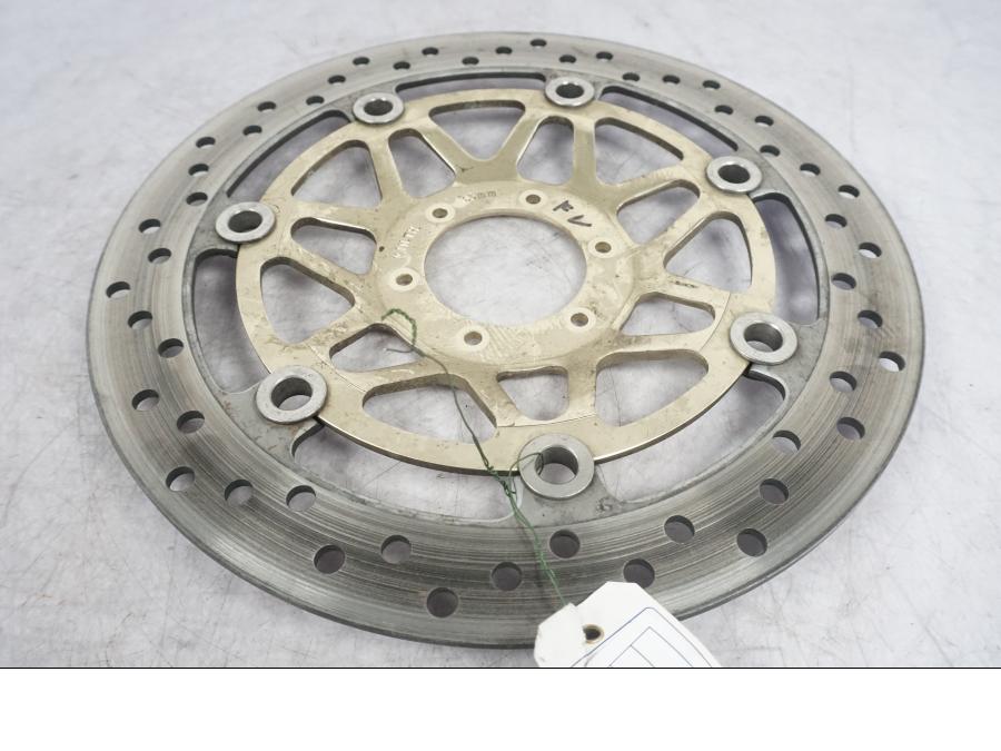 Höger sida på Bromsskiva från en Honda VFR 800 -1998 motorcykel.
