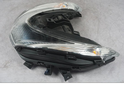 Höger sida på Positionsljus från en Honda ANC 125 -2022 scooter.