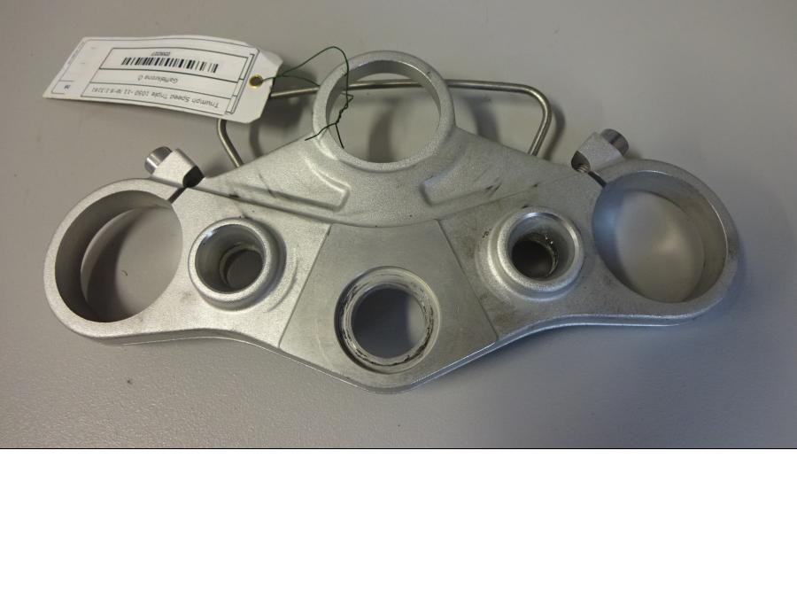 Framsidan på Gaffelkrona från en Triumph Speed Triple -2011 motorcykel.