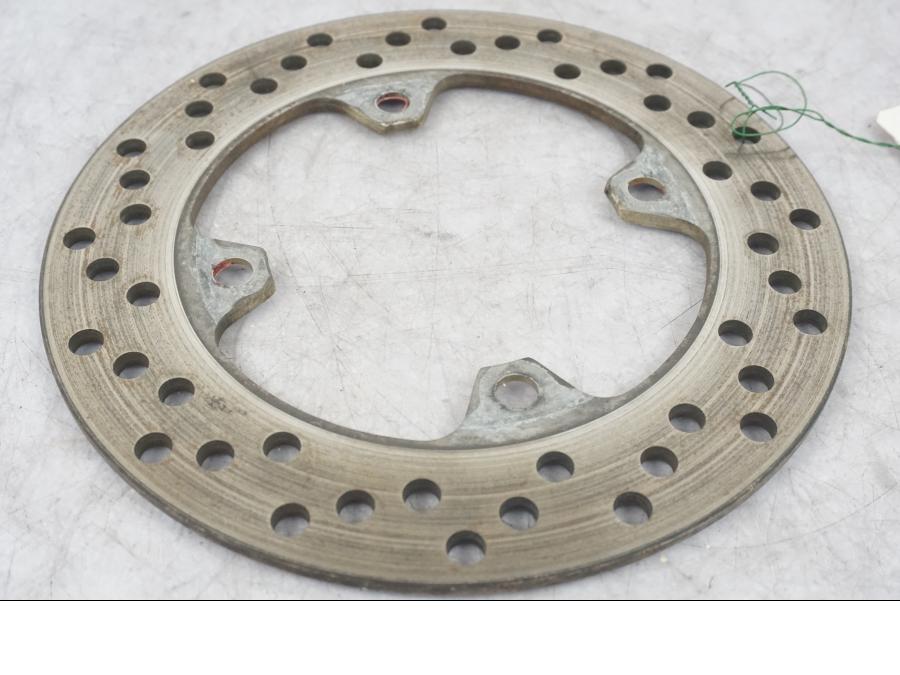 Höger sida på Bromsskiva från en Kawasaki ZX-6R -1999 motorcykel.