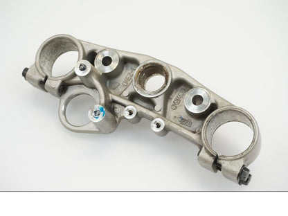 Snett uppifrån på Gaffelkrona från en Yamaha WR 125 -2010 motorcykel.