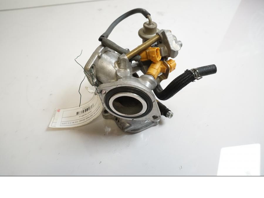 Baksidan på Spjällhus från en Kawasaki VN 1500 Mean Streak -2003 motorcykel.