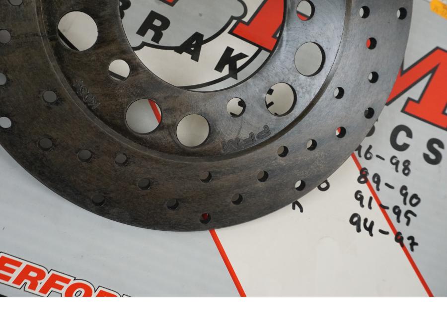 Vänster sida på Bromsskiva från en Kawasaki ZX-9R -1997 motorcykel.