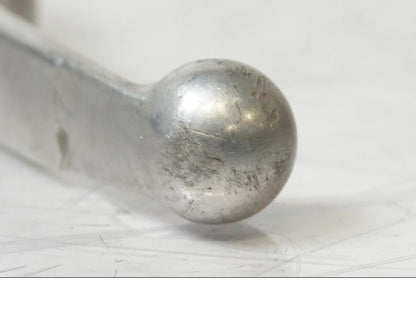 Vänster sida på <p>Bromsgrepp från Husqvarna TE 310 2009.</p>

<p>Mindre skrapmärken på knoppen samt ytliga repor se bilder.</p> motorcykel.