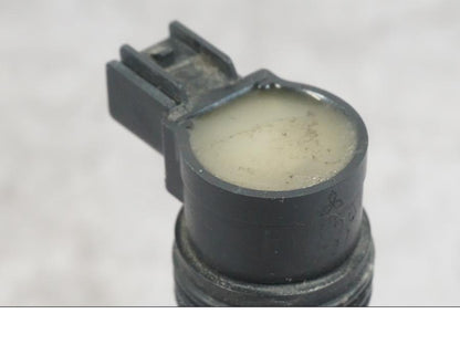 Snett uppifrån på Tändspole från en Kawasaki ZX-6R -2006 motorcykel.