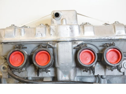 Vänster sida på Motor från en Honda CBR 1000 F -1999 motorcykel.