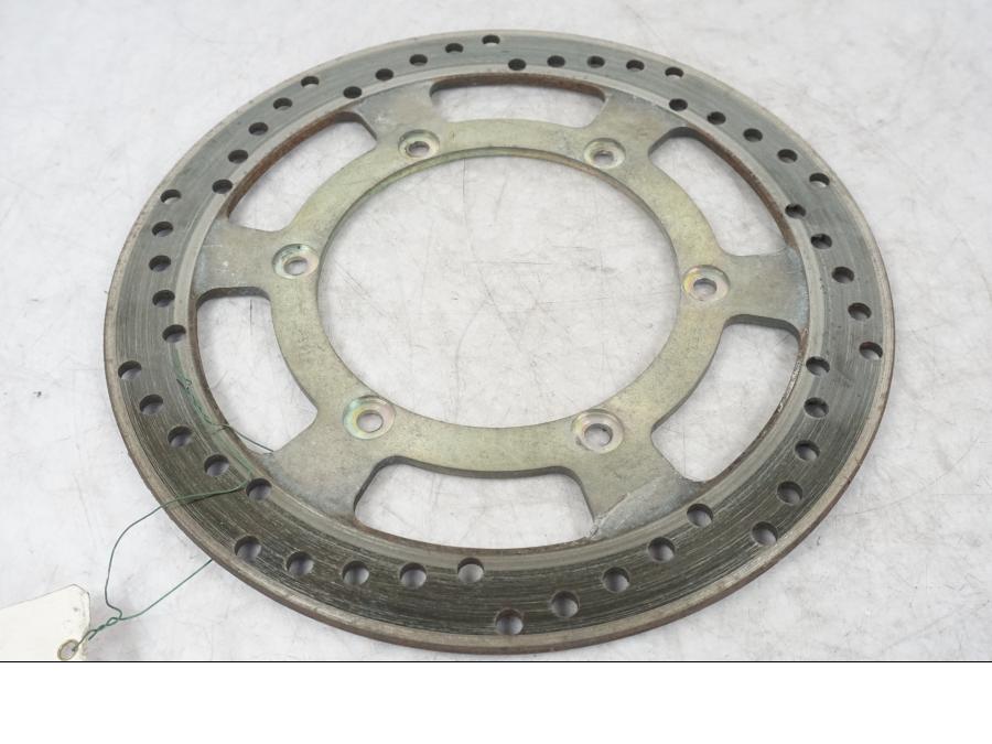 Framsidan på Bromsskiva från en Yamaha XT 600 -1999 motorcykel.