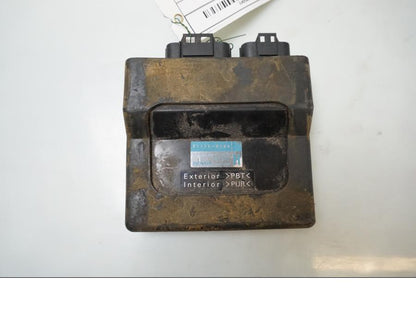 Framsidan på <p>CDI / ECU från Kawasaki Versys 650 ABS 2009.</p>

<p>Denso 211175-0204 112100-7200.</p> motorcykel.