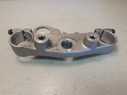 Baksidan på Gaffelkrona från en Yamaha WR 125 -2010 motorcykel.