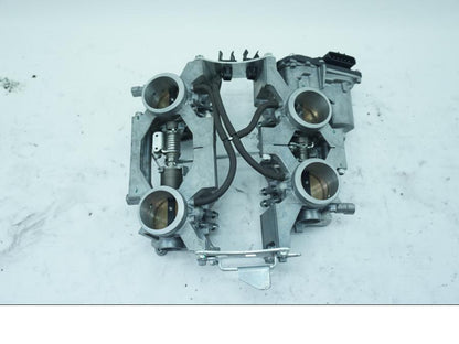 Baksidan på Spjällhus från en Honda VFR 1200 -2012 motorcykel.