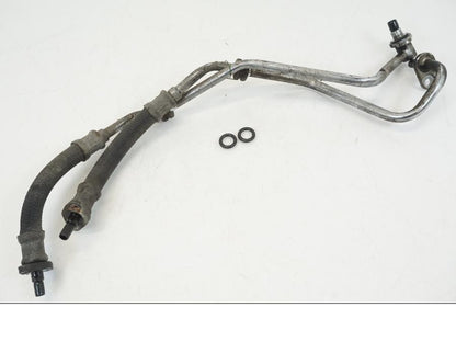 Framsidan på Oljekylslang från en Honda CB 750 -2002 motorcykel.