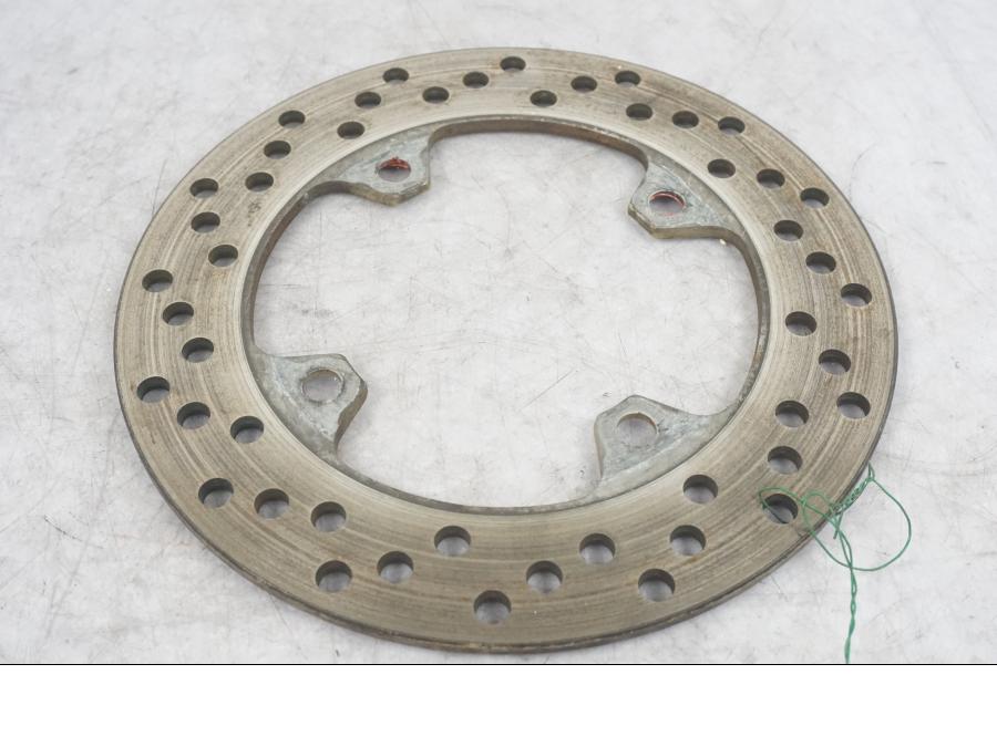 Baksidan på Bromsskiva från en Kawasaki ZX-6R -2002 motorcykel.