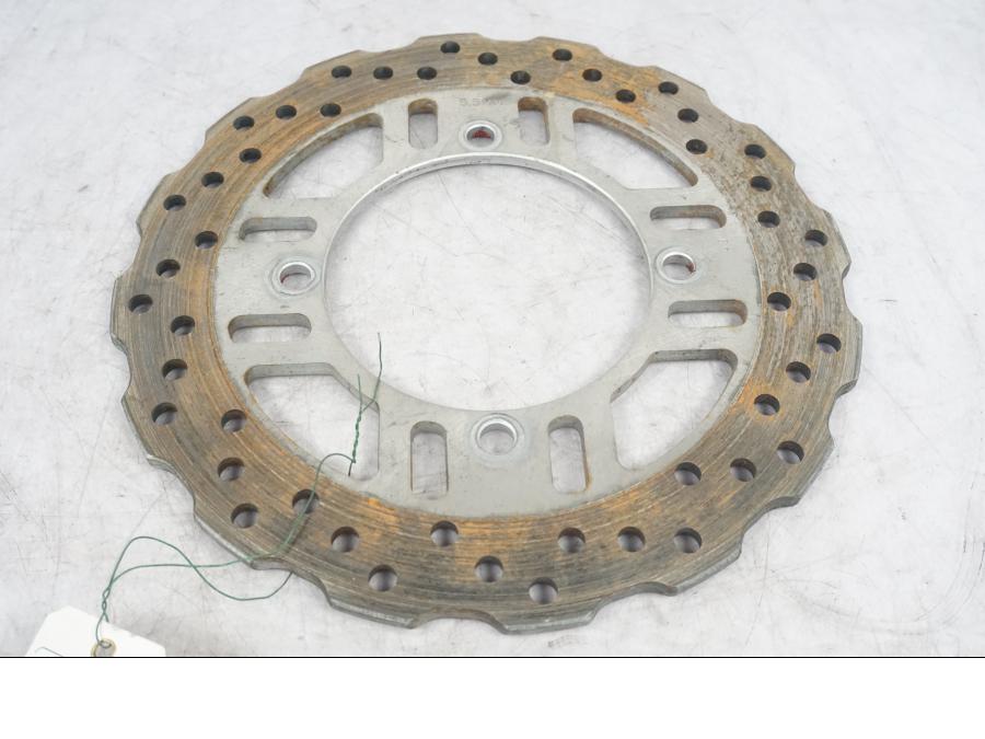 Framsidan på Bromsskiva från en Kawasaki Z 1000 -2008 motorcykel.