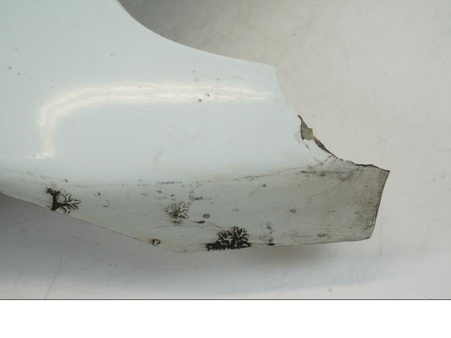 Baksidan på Sidkåpa från en Honda NSR 125 -1991 motorcykel.