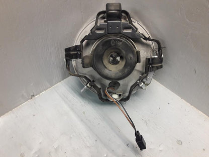 Baksidan på Strålkastarinsats från en Suzuki VL 800 -2009 motorcykel.