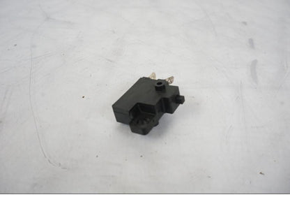 Baksidan på Bromsljuskontakt från en Honda CBR 125 R -2006 motorcykel.