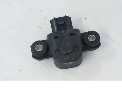 Baksidan på Tilt Sensor från en Honda SH 300 A -2011 scooter.