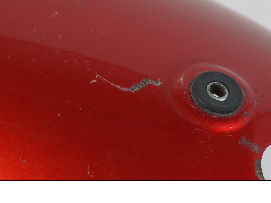 Snett uppifrån på Bakskärm från en Triumph Bonneville -2012 motorcykel.