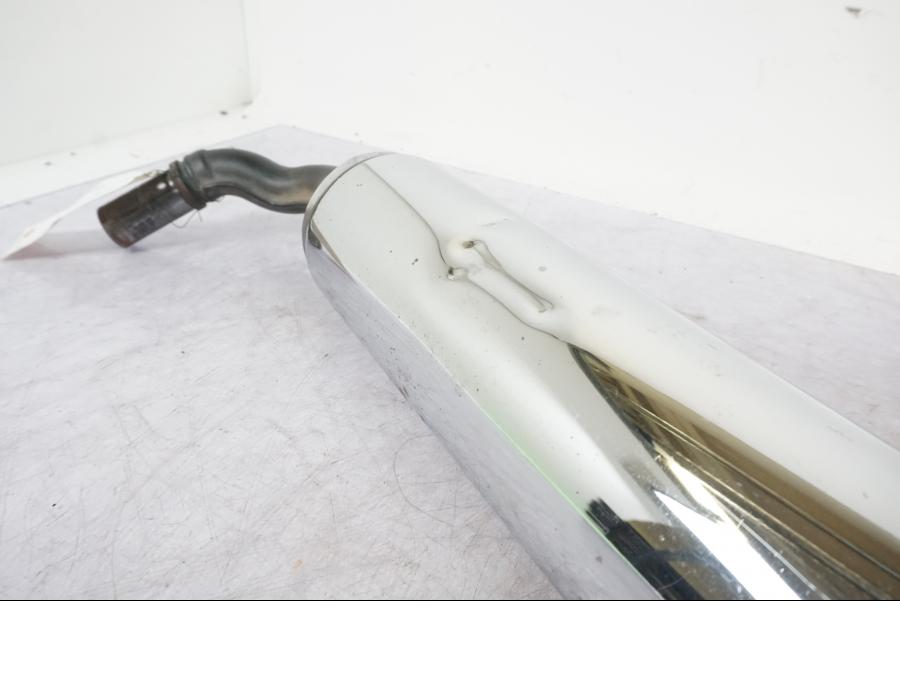 Baksidan på Ljuddämpare från en Kawasaki VN 1500 Classic Tourer -2000 motorcykel.