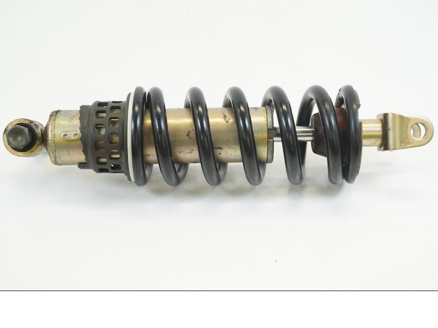 Baksidan på Stötdämpare från en Yamaha XVS 1100 -2003 motorcykel.