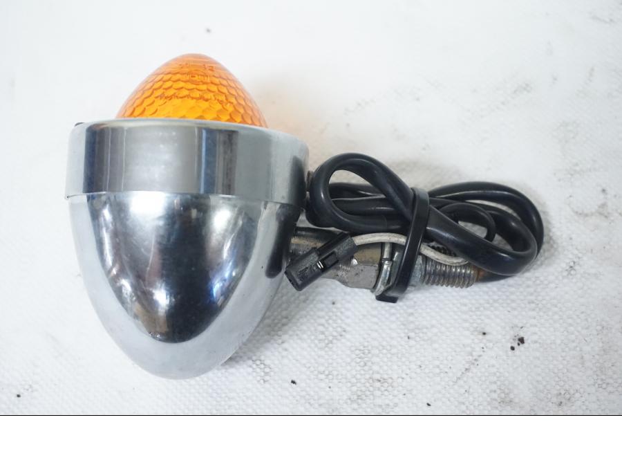 Baksidan på Blinkers från en Triumph Bonneville -2001 motorcykel.