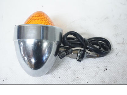 Baksidan på Blinkers från en Triumph Bonneville -2001 motorcykel.