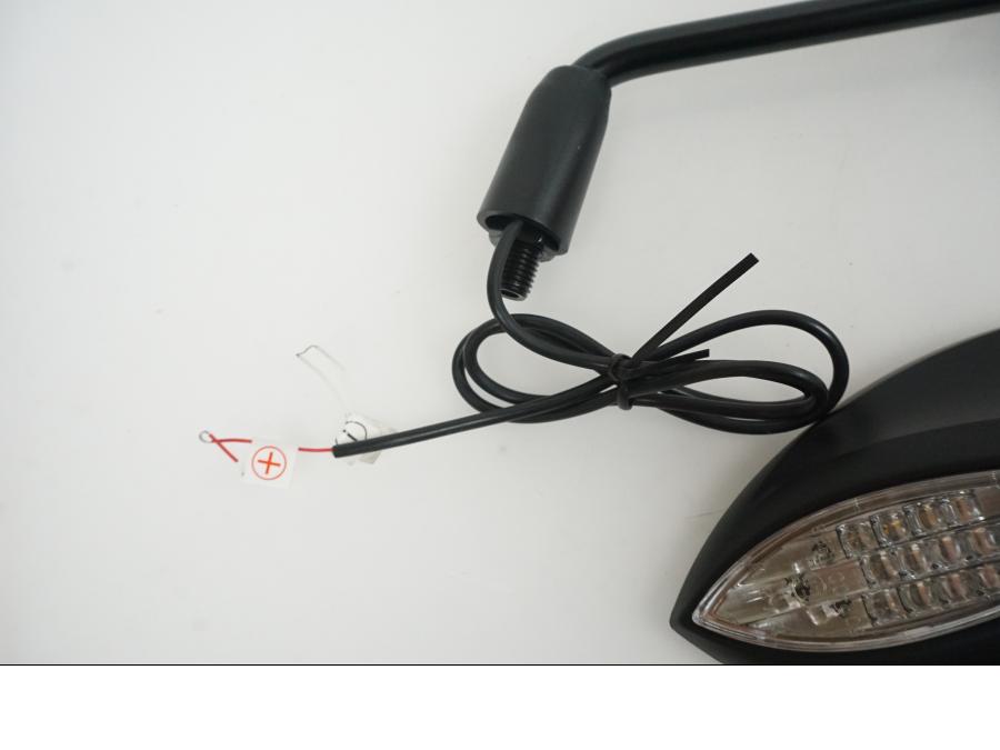 Snett uppifrån på Backspegel från en Universal Universal -0 moped.