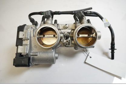 Framsidan på Spjällhus från en Aprilia Tuono V4R -2018 motorcykel.