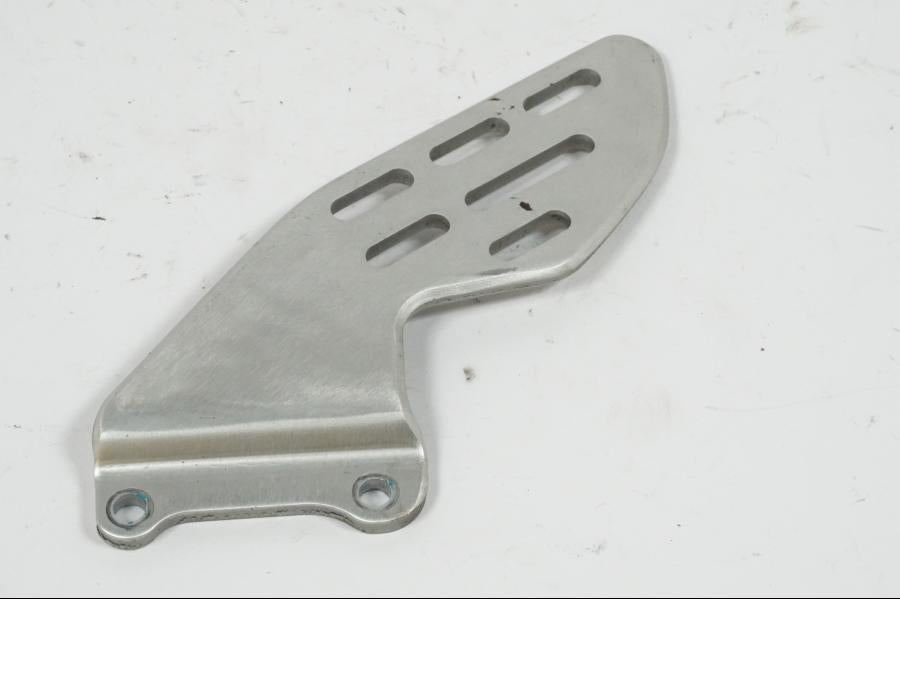 Baksidan på Fotpinnehälskydd från en Yamaha YZF 1000 R1 -2007 motorcykel.